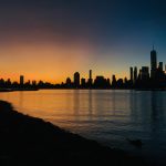 body of water during golden hour