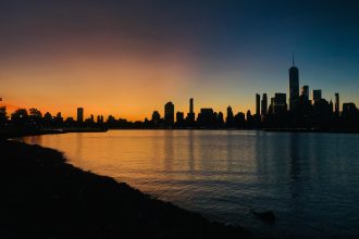 body of water during golden hour