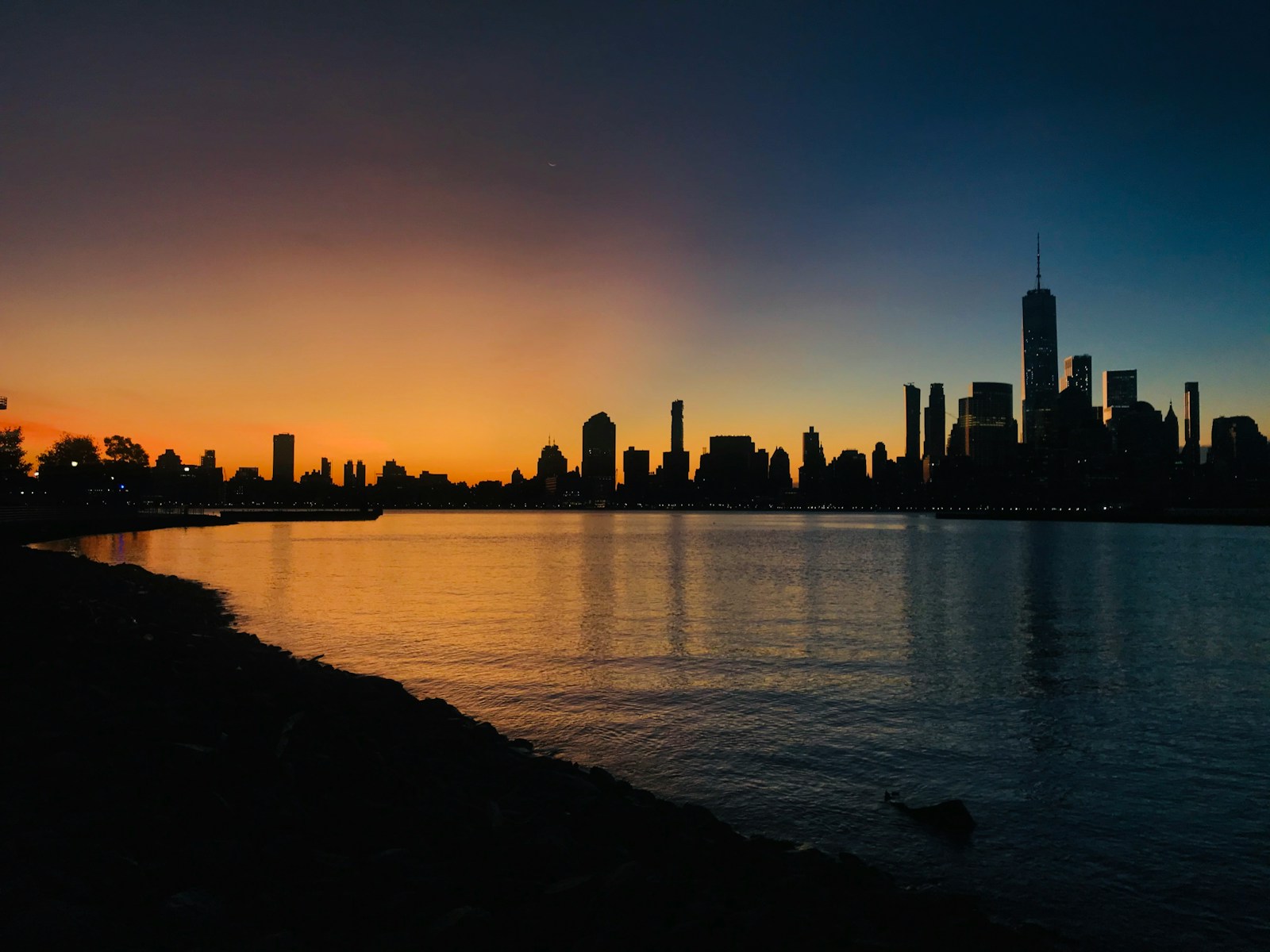 body of water during golden hour