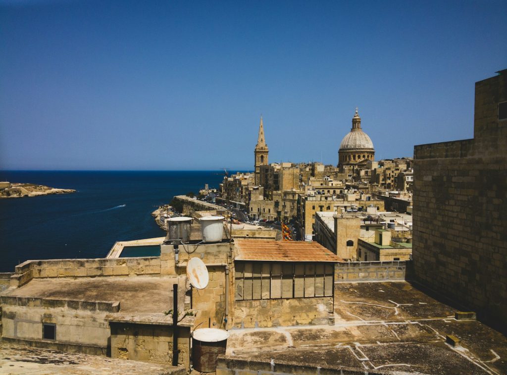 a view of a city next to a body of water